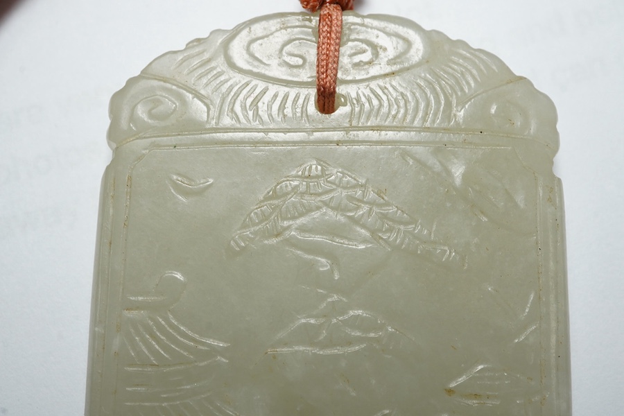 An unusual Chinese pale celadon jade plaque, 19th century